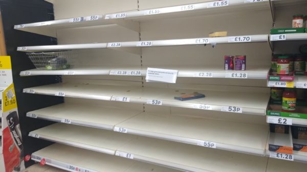 A picture showing empty pasta shelves in a British supermarket