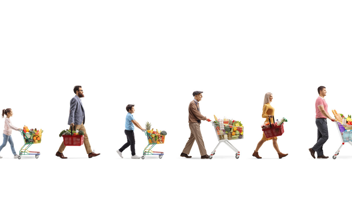 Long queue of people waiting at the cash register in a supermarket isolated on white background