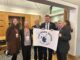 Colin Smyth MSP and representatives from Scottish Fair Trade holding a banner that says Fair Trade Nation ScotlandScotland