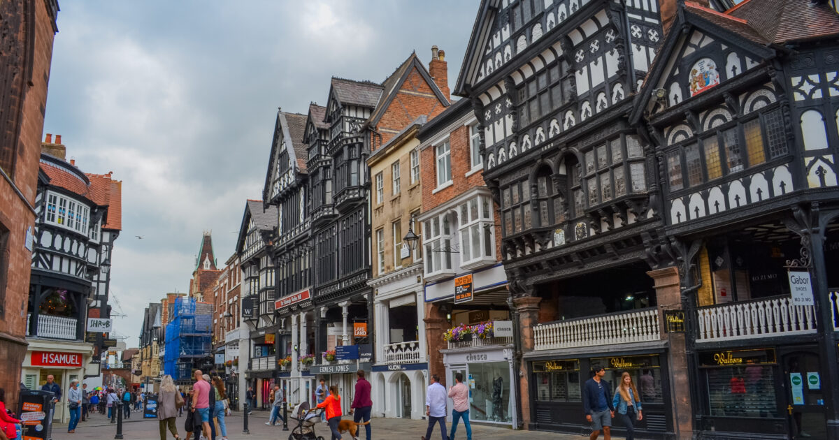 The main shopping street of the city with view to historic buildings. At the moment these are shops, cafes and pubs.