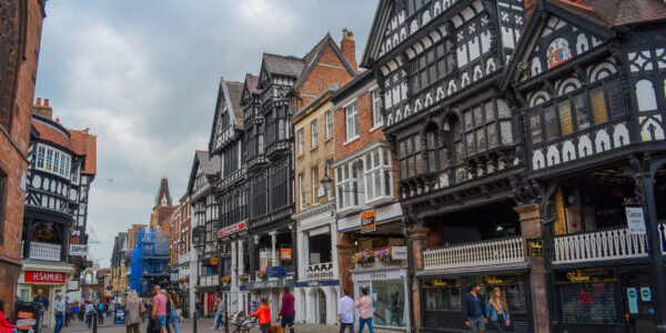 The main shopping street of the city with view to historic buildings. At the moment these are shops, cafes and pubs.